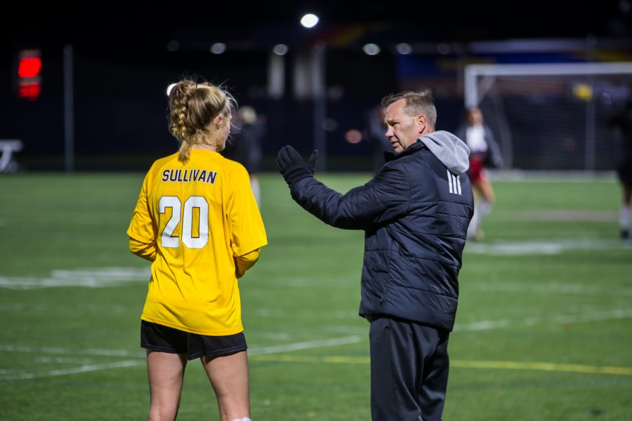 Womens Soccer Head Coach Bob Sheehan Talks to Megan Sullivan (20) during halftime in the game against Detroit Mercy in Detroit on Friday Night. The Norse Defeated Detroit Mercy 2-0 on the night.
