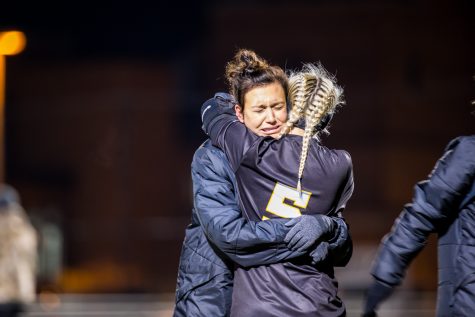 Senior Ally Perkins (6) is comforted by a teammate after the loss in the semifinal game of the Horizon League Tournament in Milwaukee, Wisconsin. The Norse fell in double overtime to the Flames 1-0.