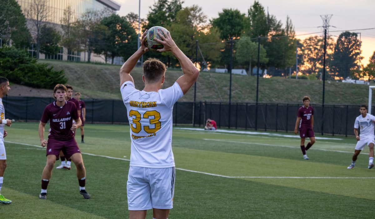 NKU men's soccer's Joshua Cline throws the ball into play on Aug. 25 against Bellarmine.