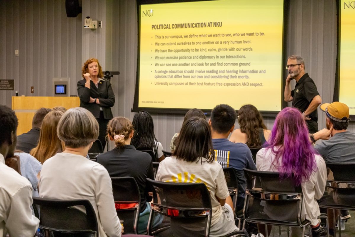 President Cady Short-Thompson (left) and Dr. Zachary Hart (right) share their presentation about political communication on Monday night.