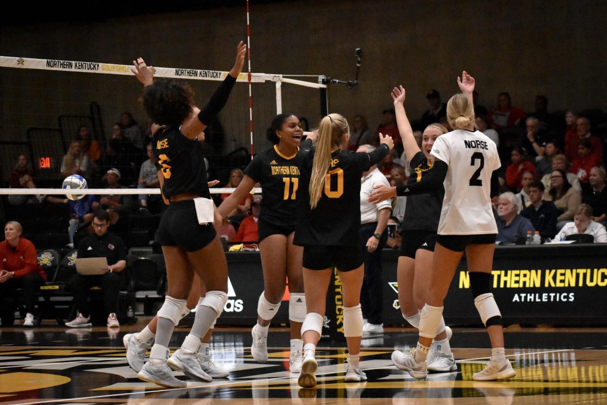 The Norse celebrating after getting a huge point on Sunday against Louisville. 