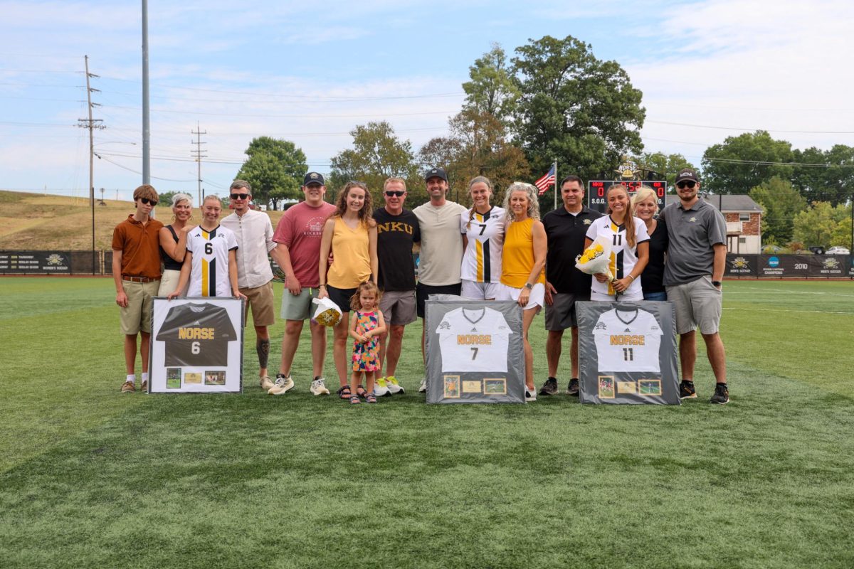 Seniors Lilly Yordy (left), Lydia Self (middle), and Emma McSwigan (right) participate in senior day festivities. 