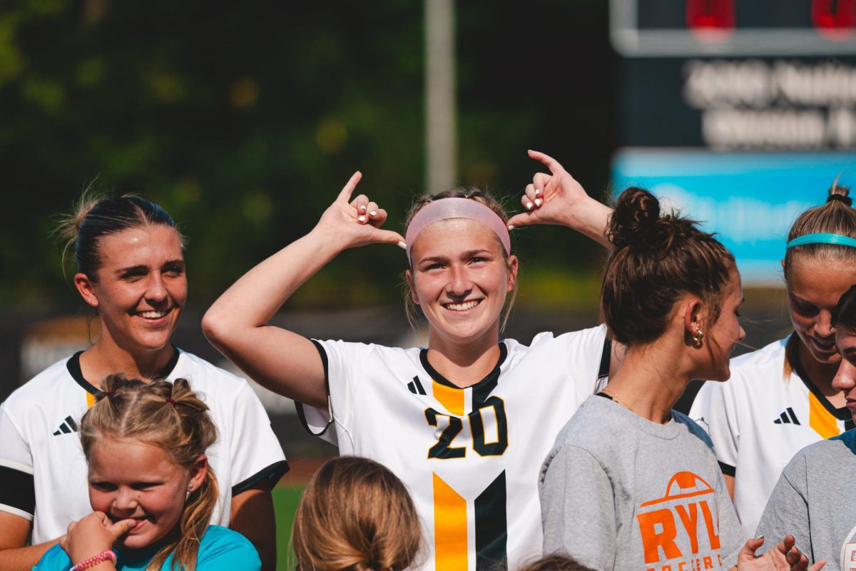 Women's soccer celebrates their fifth straight win.