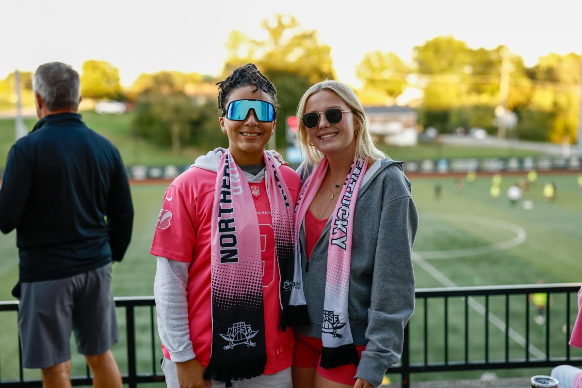 Fans coming out to support the women’s soccer team while wearing pink and getting their free scarfs for Breast Cancer Awareness.