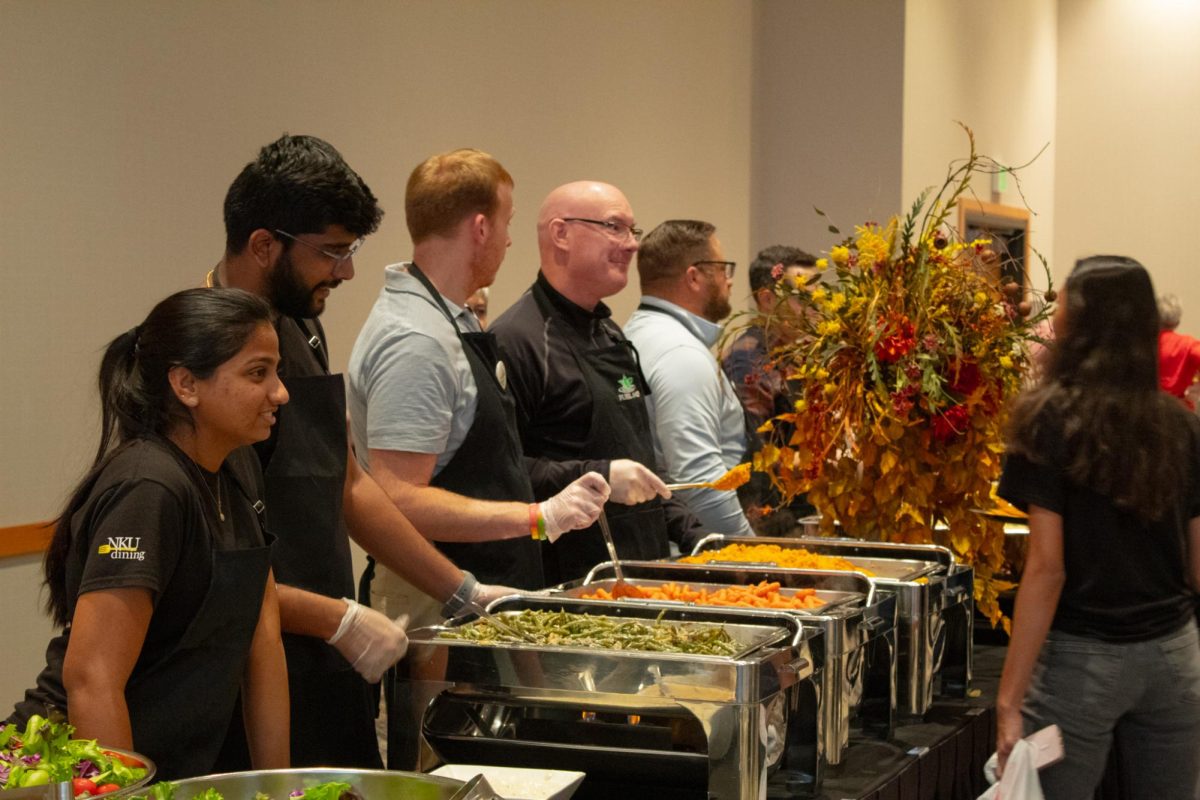 Students make their plates at FUEL NKU's Thanksgiving dinner. 