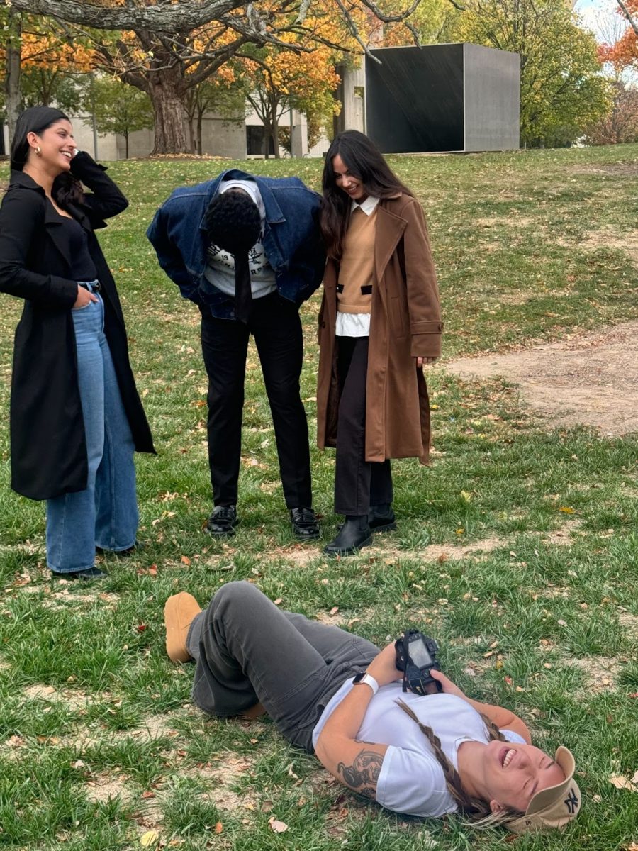 Roden lays on the ground to capture the perfect magazine cover shot.