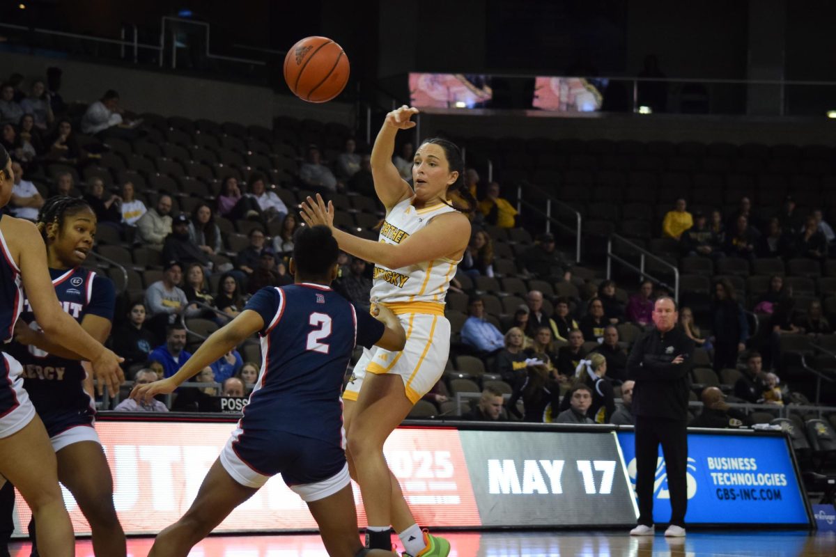 Macey Blevins making a cross-body pass. She finished with three assists.