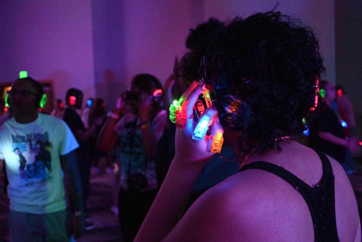 Fun accessories, such as glow sticks and finger lights, added to the colorful night.