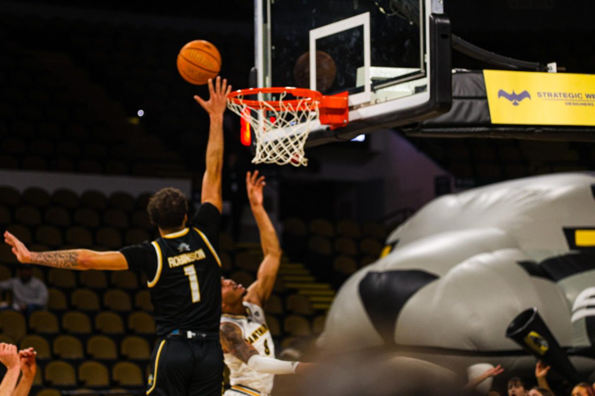 Trey Robinson elevates for a block attempt. NKU had five blocks on the day.