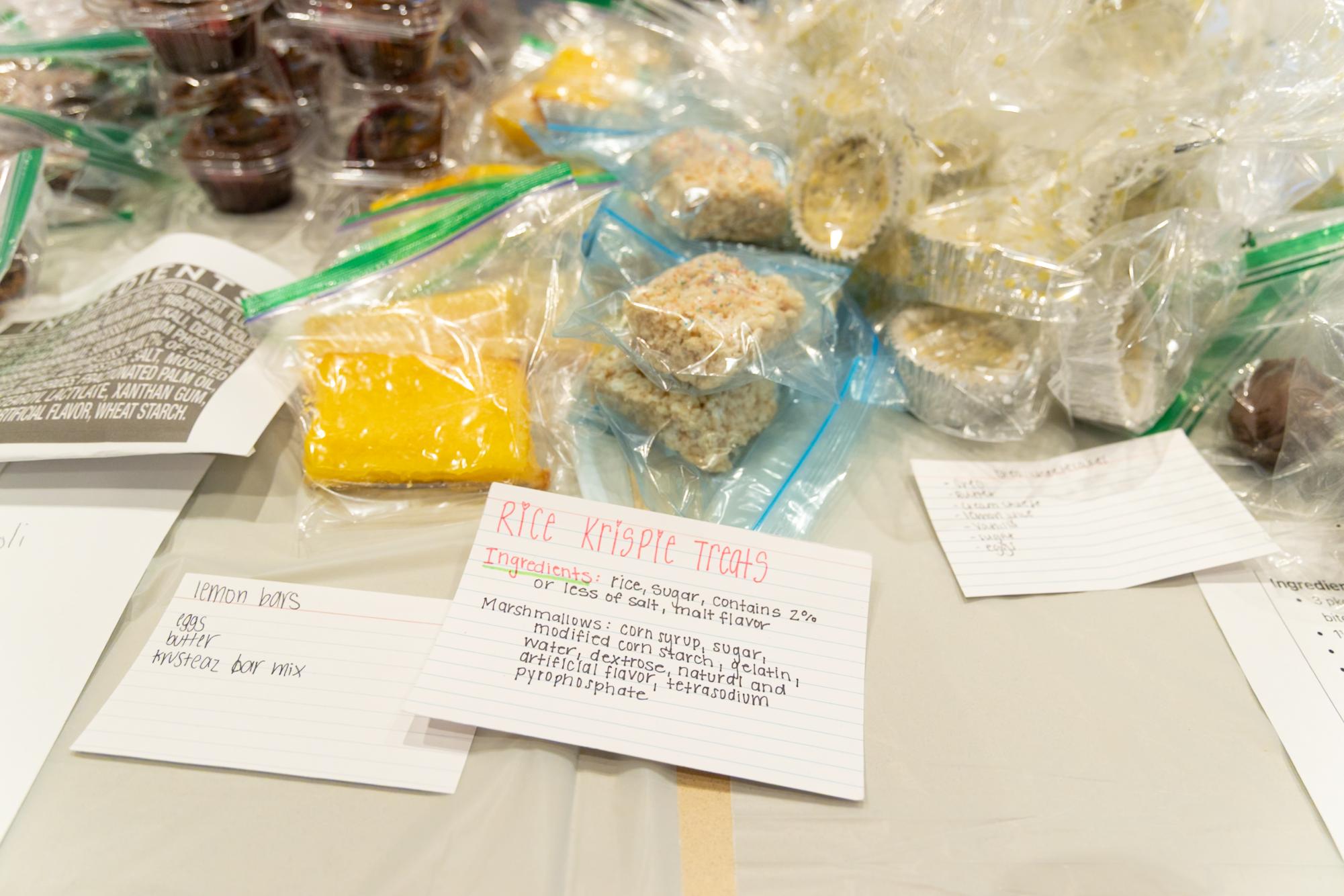 Recipes and desserts laying out to be sold during the bake sale aspect of the event. 