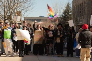 Students chanting on Friday afternoon on the Student Union Plaza. 