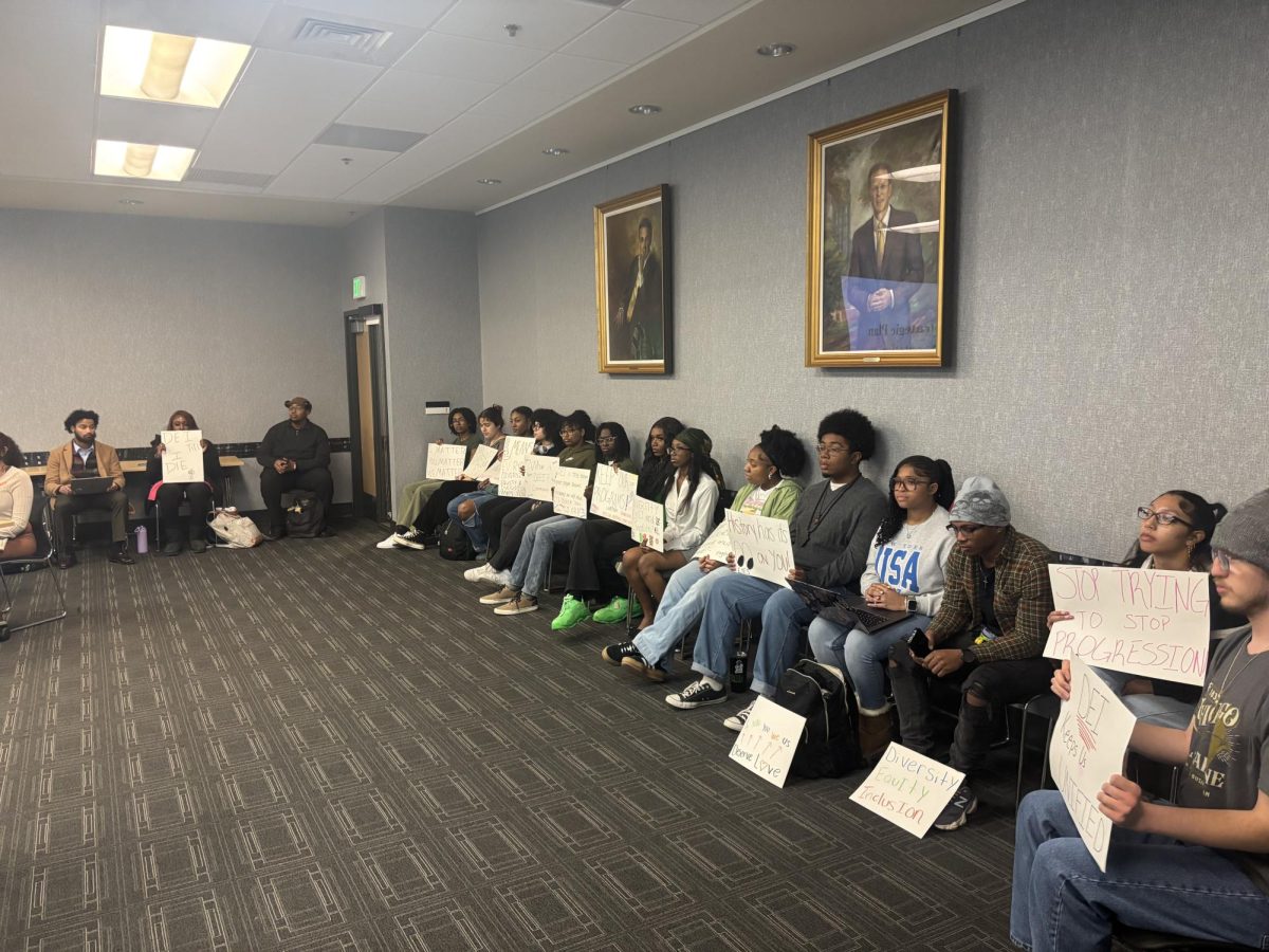 Students sat in to protest anti-DEI legislation during the Student Government Association's meeting on Monday.