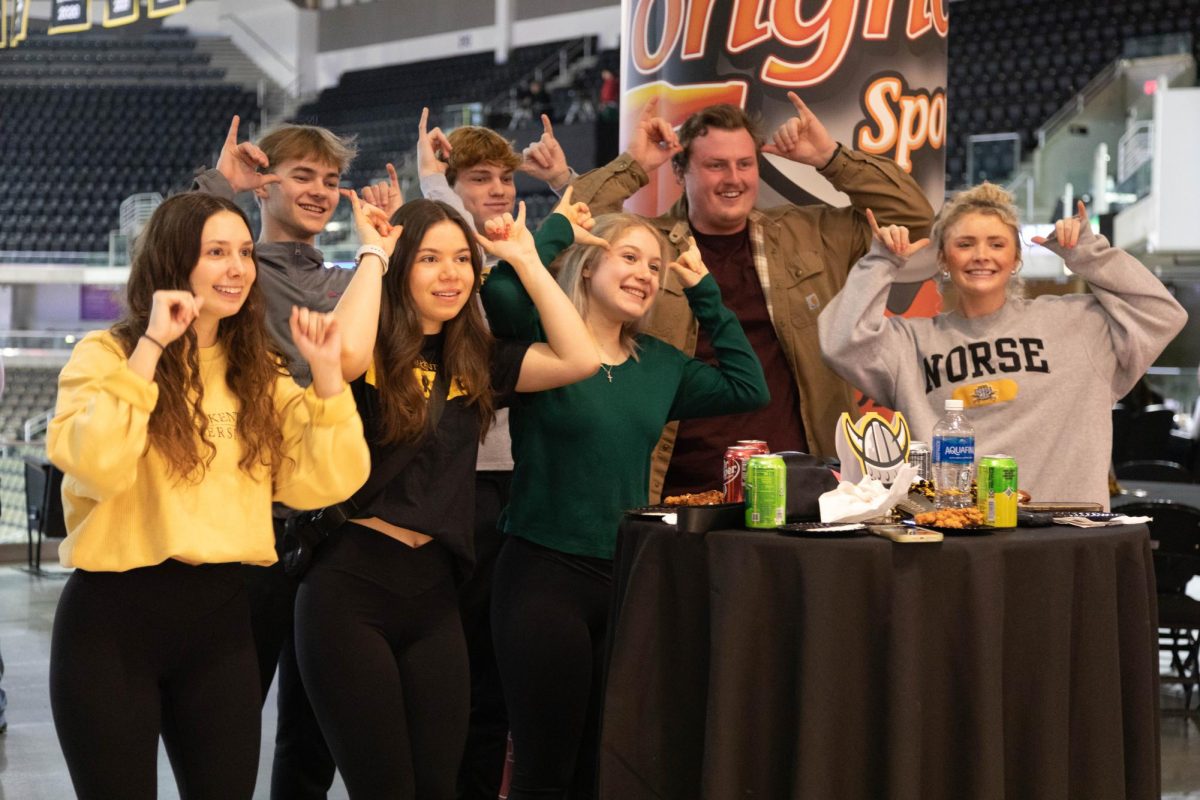 Although the tailgate was moved inside due to rain, students still showed up before the game on Saturday to celebrate their Norse pride.