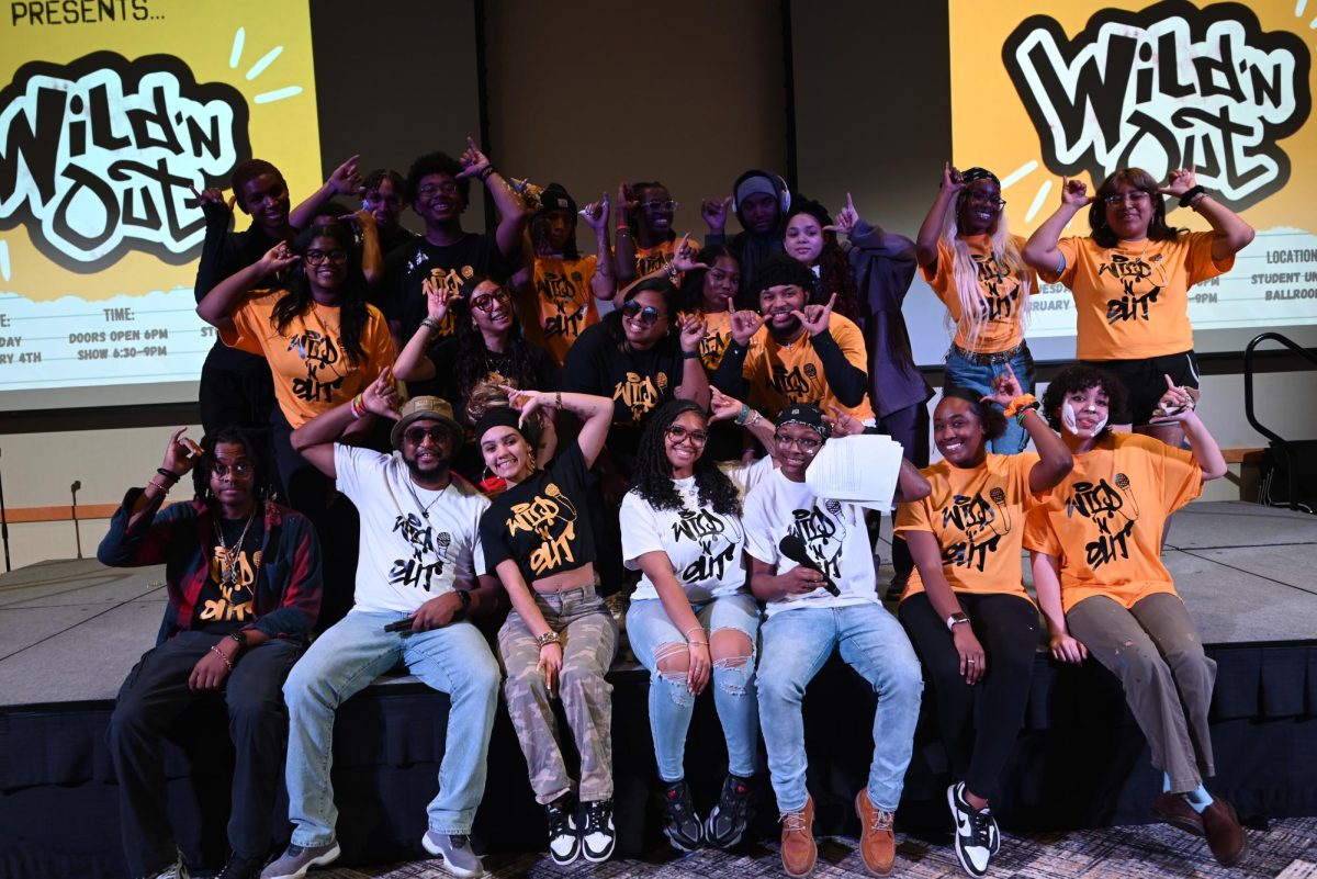 NKU students that participated in the Wild 'N Out event posed on stage for a group photo. 